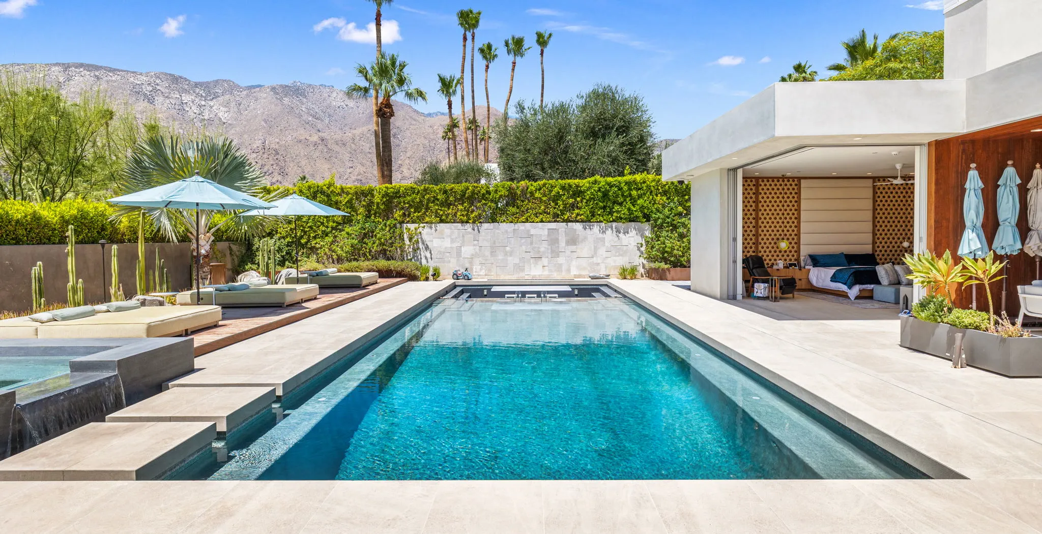 Modern JL Development Group home in Palm Springs with a pool, spa and mountain views
